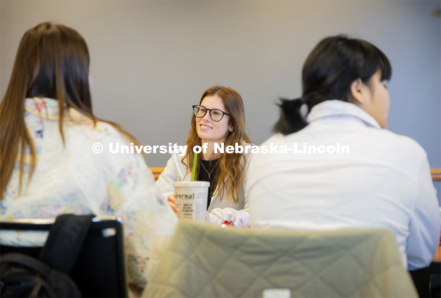 Carlee Petereit listens to her talking partner during the Study Abroad Speed Dating. February 13, 2024. Photo by Kristen Labadie / University Communication. 